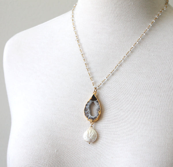 Agate slice with pearl necklace