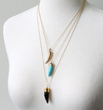 Horn pendant necklaces by Peggy Li Creations
