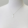 Silver Tiny Feather Necklace by Peggy Li Creations