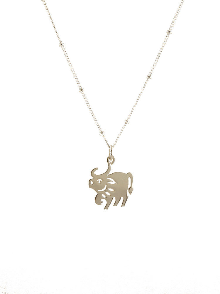 Gold year of the ox pendant
