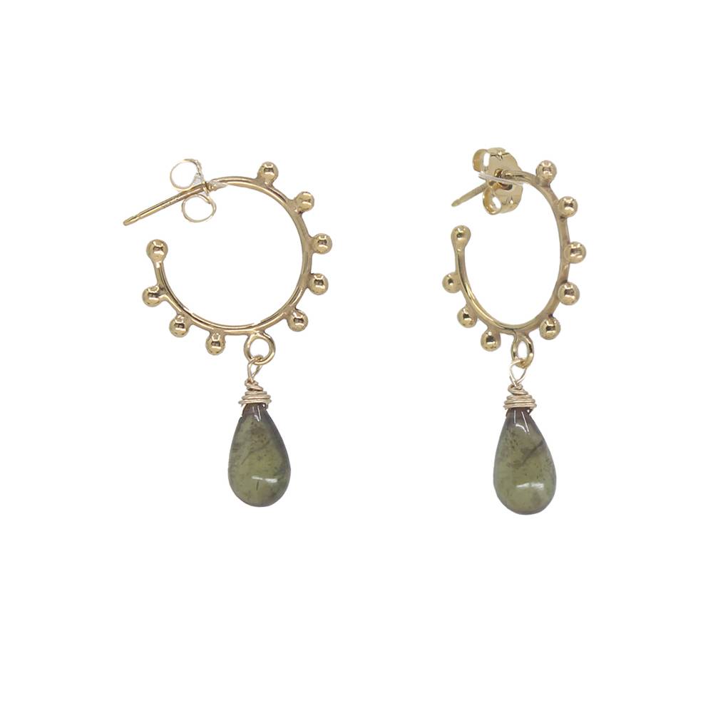 Gold hoop earrings with green teardrop stones on a white background