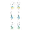 Six pairs of dangling earrings arranged in a grid on a plain white background. Each pair has a silver fishhook ear wire, a small turquoise bead, and a larger striped glass bead in yellow, blue, or green.