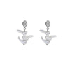 Pair of earrings with white pearls and silver accents on a white background