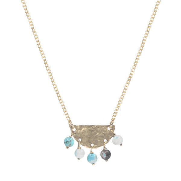 Necklace with a gold chain and semi-circular pendant featuring turquoise beads on a white background