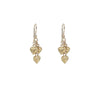 Gold heart-shaped earrings on a white background