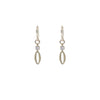 Pair of gold earrings with small diamonds like gems on a white background