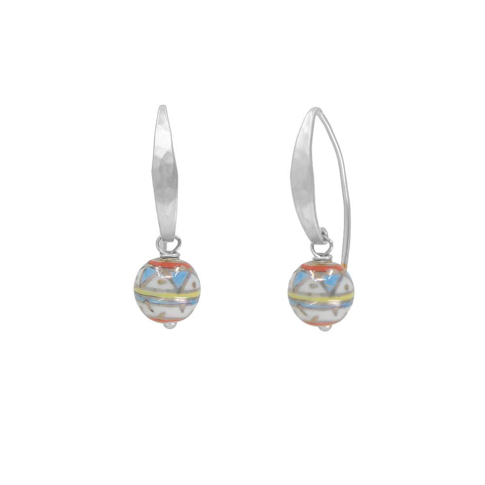 Pair of silver earrings with colorful spherical beads on a white background