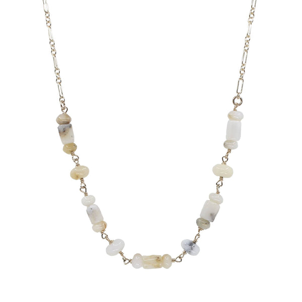 Necklace with natural stone beads on a white background