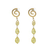 Gold spiral earrings with yellow teardrop-shaped stones on a white background