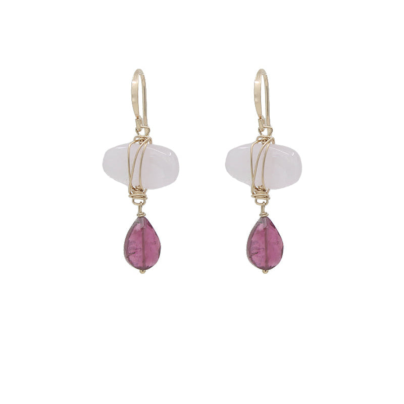 A pair of earrings featuring pale pink cotton candy morganites wire wrapped and pink tourmaline teardrops.
