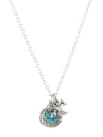 Sterling silver bird and bird nest charm necklace with turquoise eggs