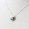 Silver bird nest necklace with turquoise eggs