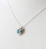 Silver bird nest necklace with turquoise eggs
