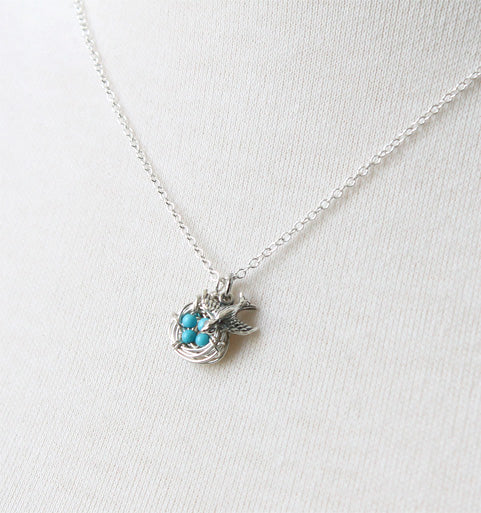 Silver bird nest necklace with turquoise eggs