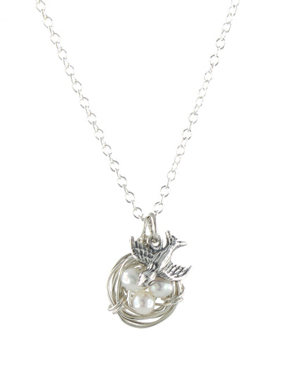 Bird Nest Necklace in sterling silver with pearl eggs