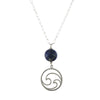 A necklace with a sterling silver chain and a pendant featuring a wave design with a deep blue lapis accent.