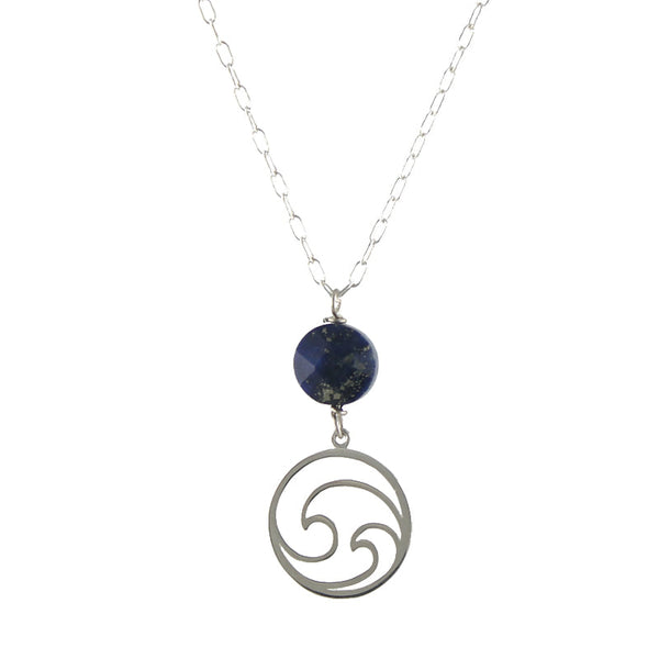 A necklace with a sterling silver chain and a pendant featuring a wave design with a deep blue lapis accent.