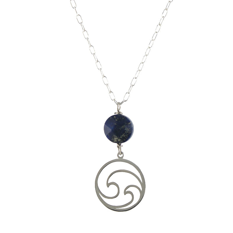 A necklace with a sterling silver chain and a pendant featuring a wave design with a deep blue lapis accent.