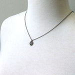Oxidized silver pave diamond disc necklace