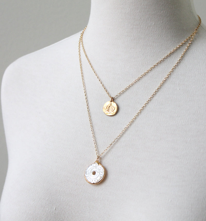 Double coin pendant by peggy li