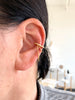 Draped chain earcuff