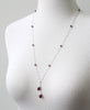 Long gemmed necklace in garnets