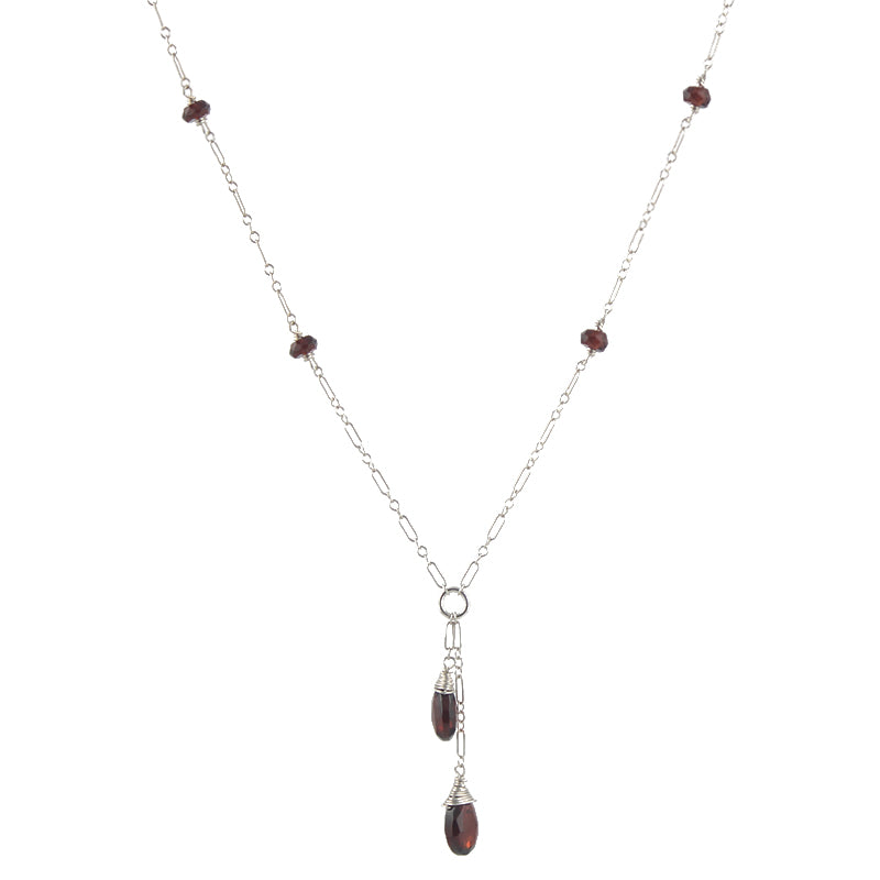 Long gemmed necklace in garnets