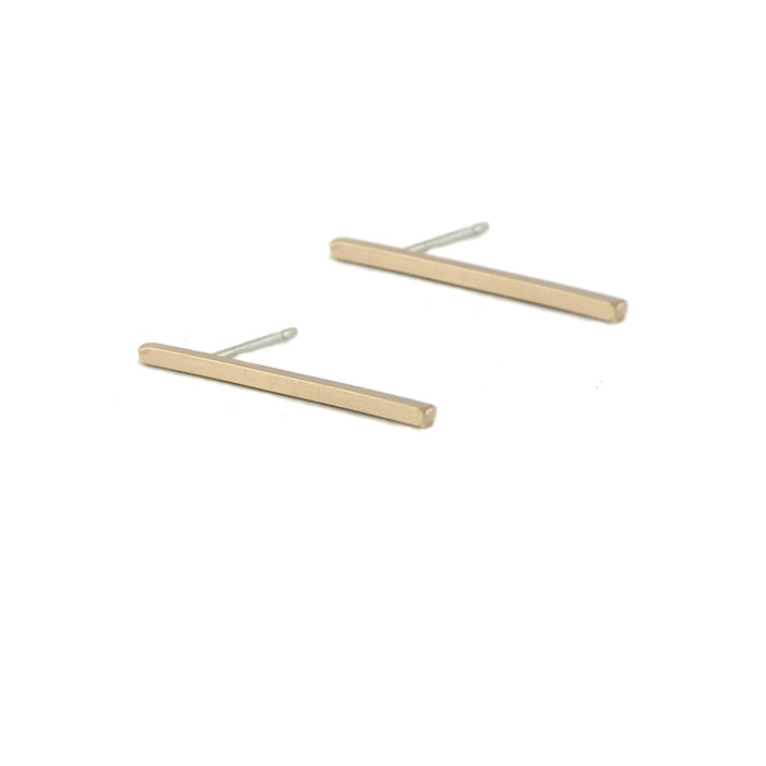 Long staple stud earrings