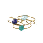 Open metal cuff with gemstone focal