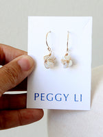 Jane (Gina Rodriguez) opal chip earrings