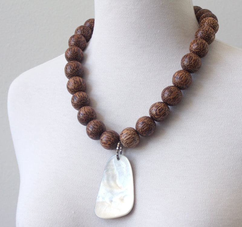 Palm wood and shell necklace