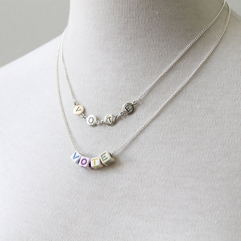 Sterling silver vote letter necklace