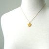 Small gold lotus pendant necklace
