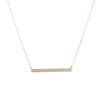 Skinny stamped gold bar necklace