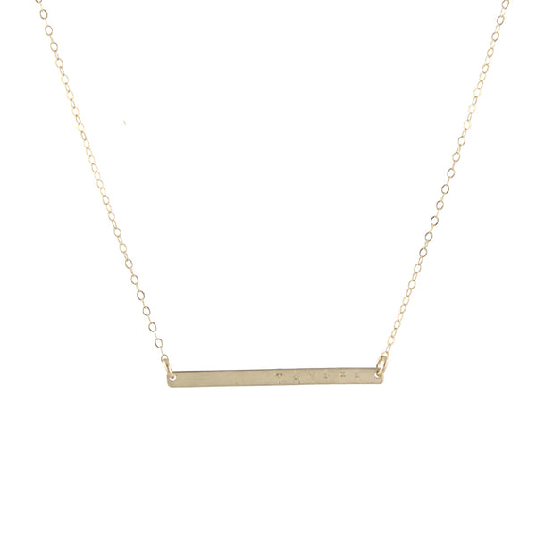 Skinny stamped gold bar necklace