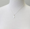 Silver Tiny Feather Necklace by Peggy Li Creations