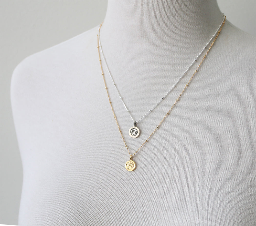 Tiny Om Charm necklaces