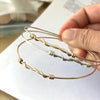 Twisted Bangle Bracelets by Peggy Li Creations