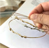 Twisted Bangle Bracelets by Peggy Li Creations