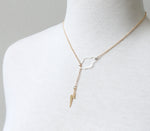 Weather the storm gold bolt lariat