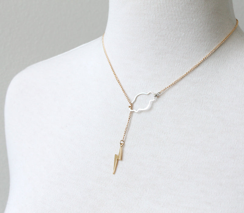 Weather the storm gold bolt lariat